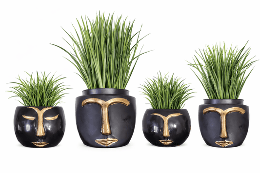 Black Moai head vase decorative sculpture for event decor and floral arrangements