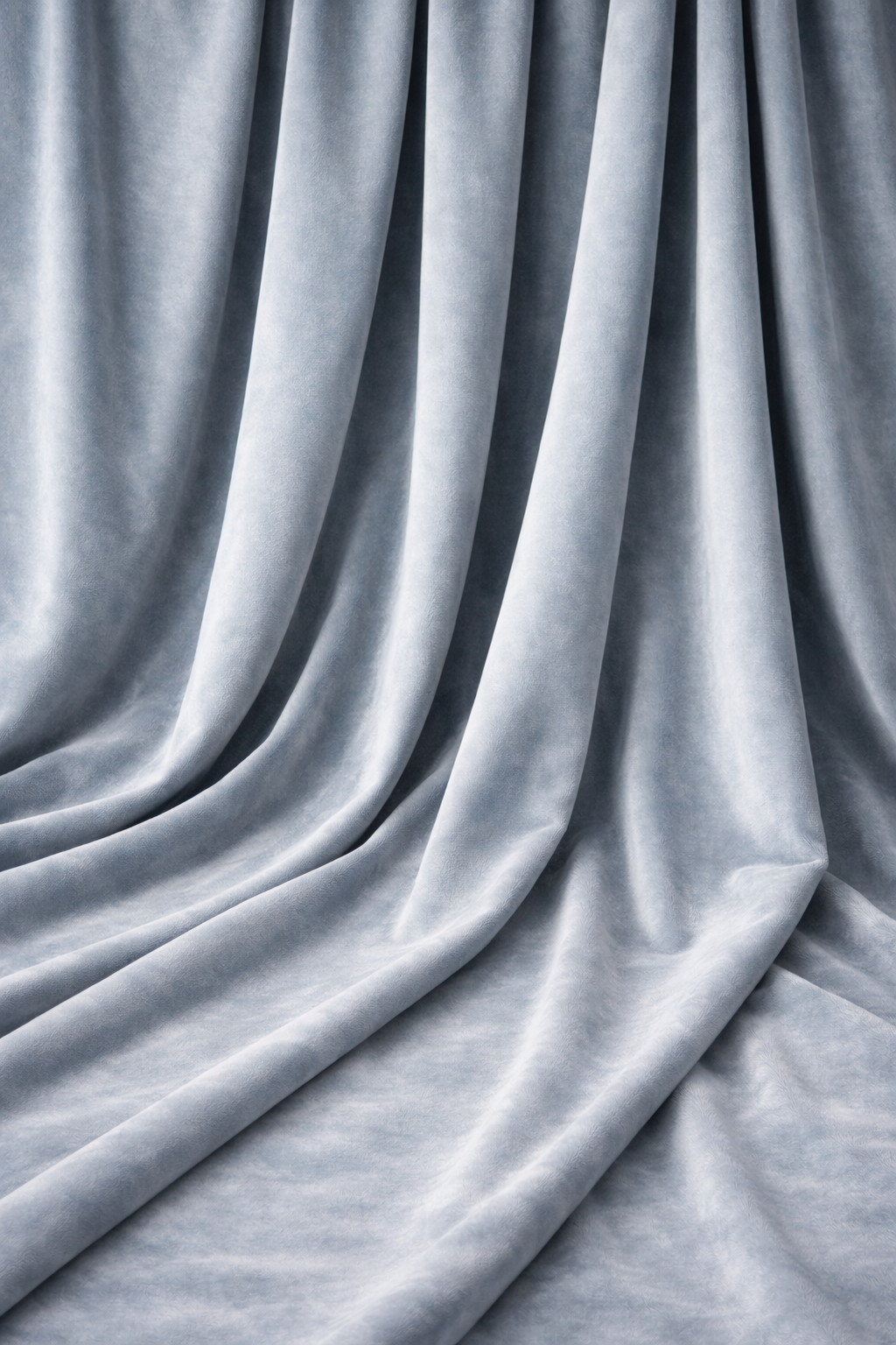 Luxurious dusty blue velvet drapes