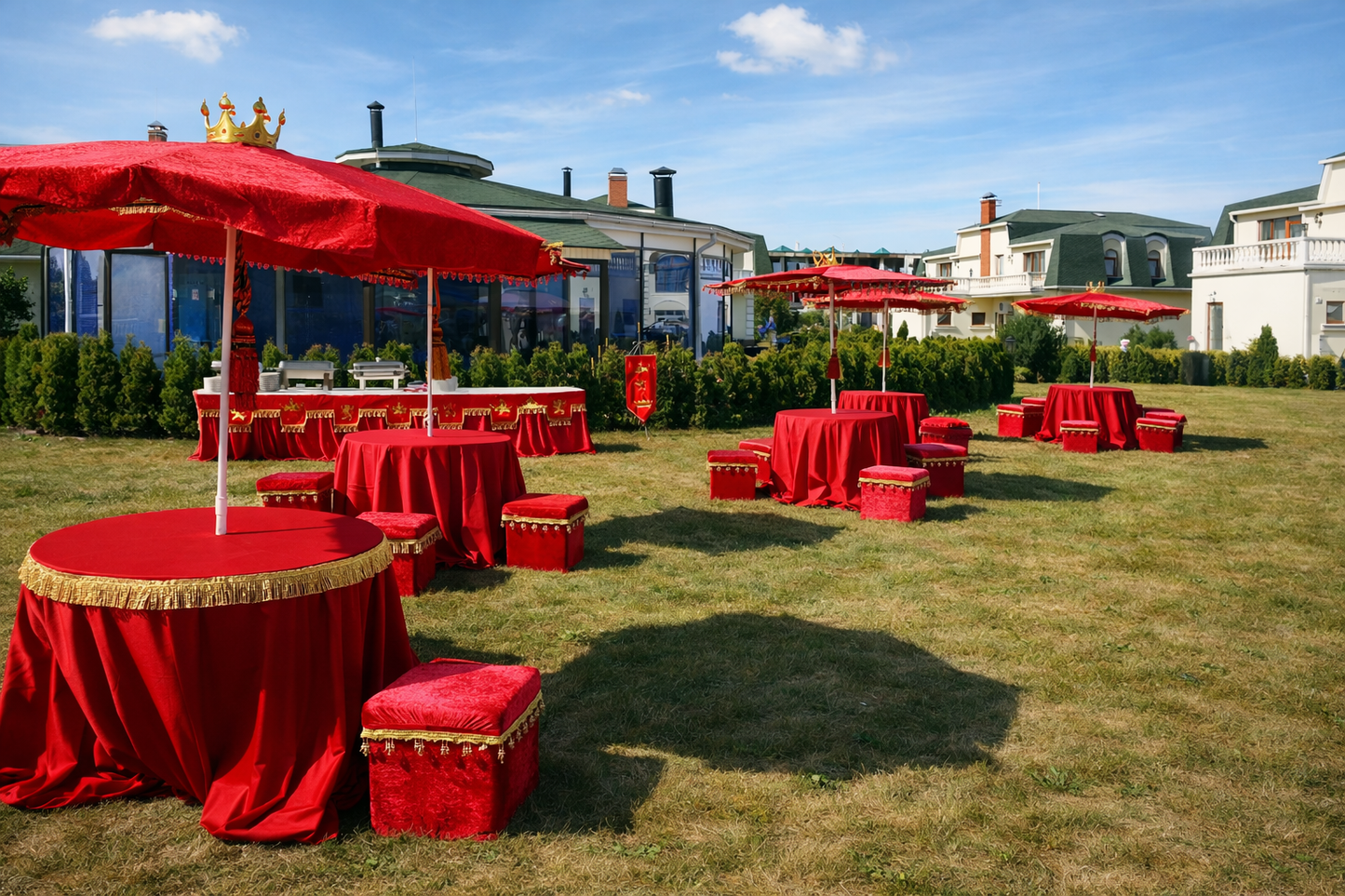 Royal red velvet ottoman with decorative fringe for photo shoots and theatrical event styling