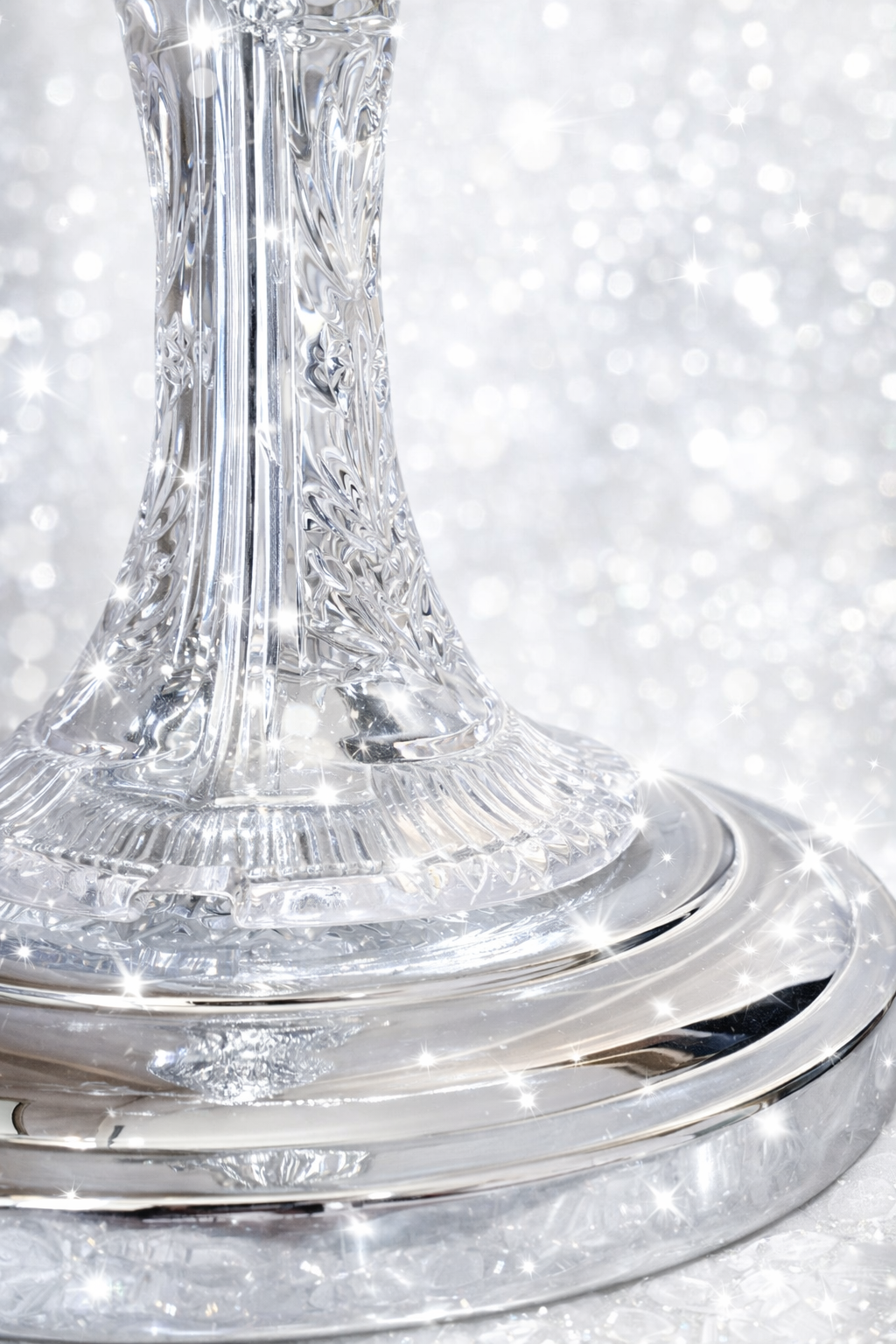 Close-up of a crystal candelabra on a glittery silver tablecloth 7skyrent