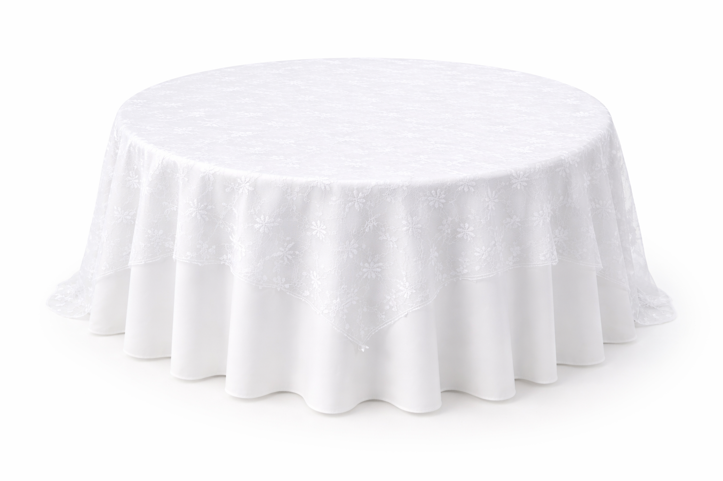 Round table covered with a white tablecloth lace tulle tablecloth for rent 7sky