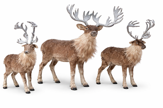Realistic soft-textured brown reindeer figurines with silver frosted antlers for luxury holiday display rental.