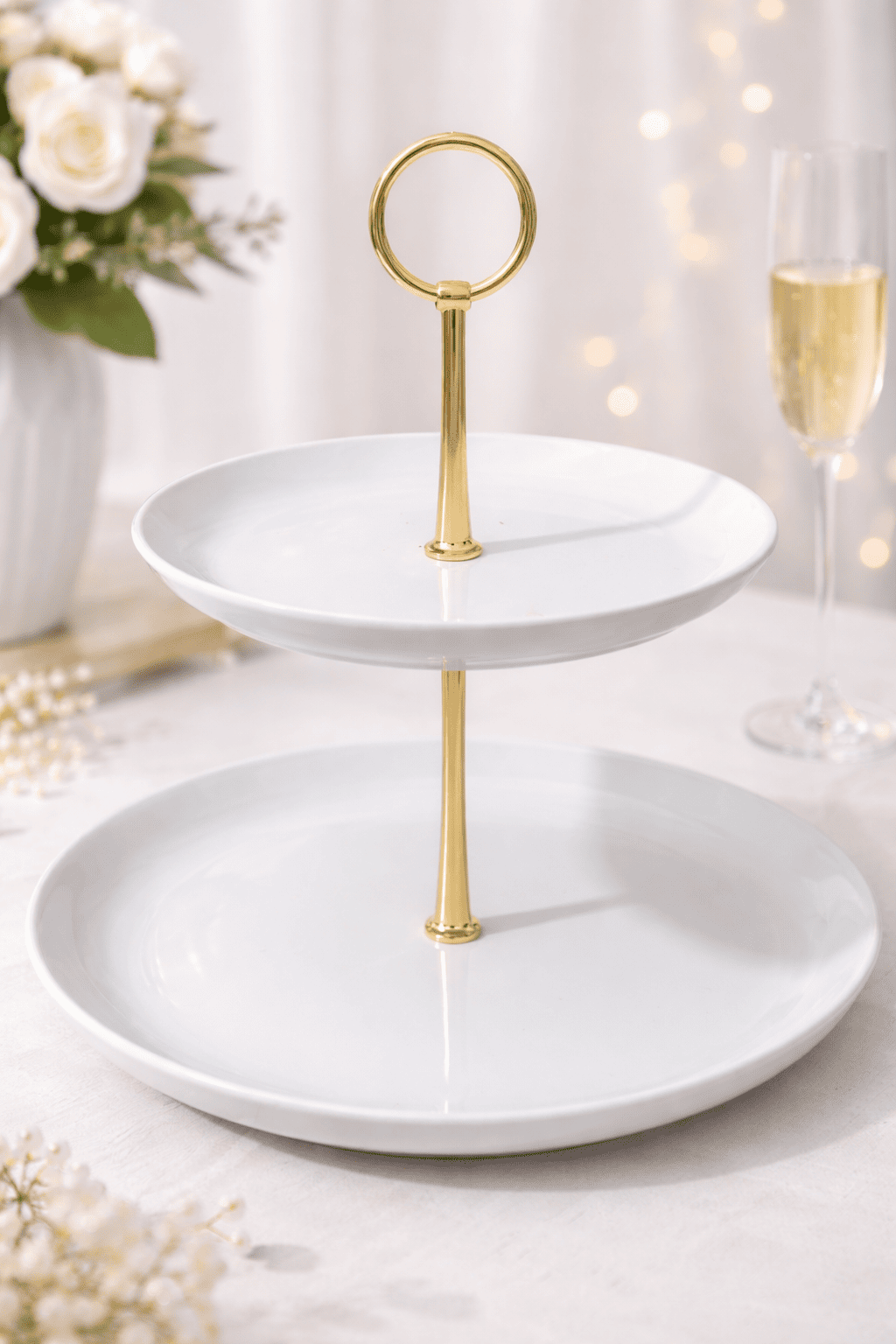 two tier white porcelain dessert stand with gold handle for dessert table and candy bar rental by 7skyrent