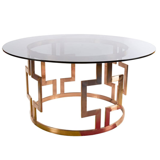 Round rose gold metal cake table with tinted glass top for wedding dessert table and lounge event decor rental